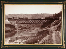 Вид железнодорожного моста через реку Сим.