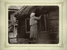 Казачка чинит окно. Цимлянская станица. 1875-1876